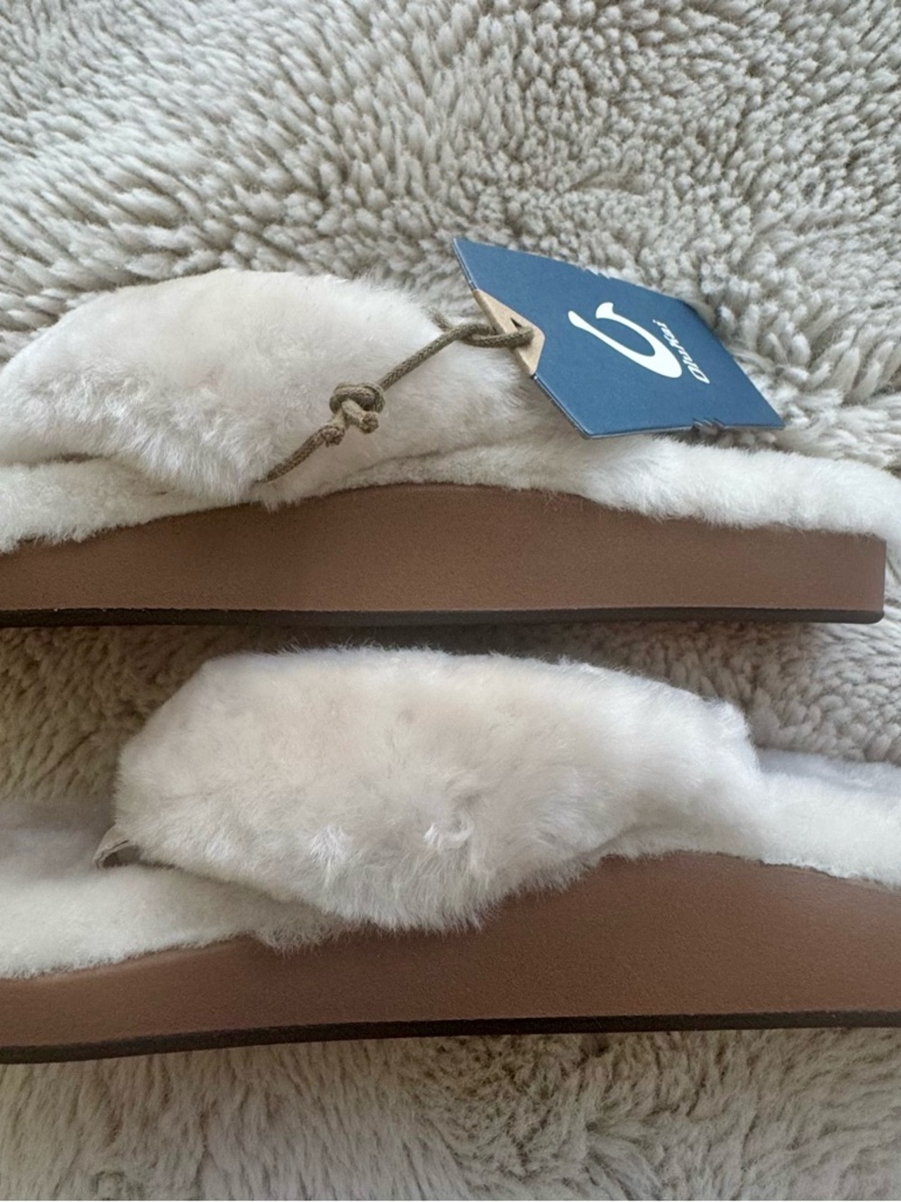 OluKai Women's Plush White Fuzzy Flip-Flop Slippers - Picture 6 of 8
